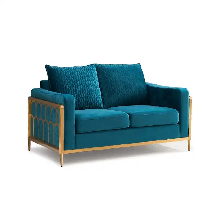 turkusowa sofa na złotym stalażu
